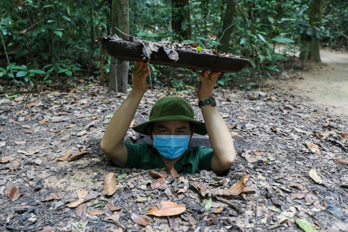 Tourists exploring the Cu Chi Tunnels near Ho Chi Minh City